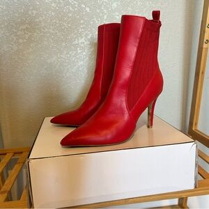 Guess red, ankle high, pointed toe boots. Size 9.